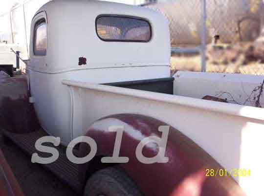 Chevy Pickup 1946 1/2 ton rear view click for next antique auto picture