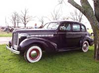 buick 1938 special straight 8, suicide 4 door, driver side view, click for a larger picture