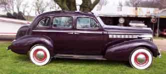 Buick 1938 special straight 8,  suicide 4 doors passenger side of auto view, click for a larger  view