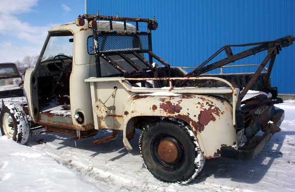 wrecker tow truck 1955 cab and bed bed back driver side view