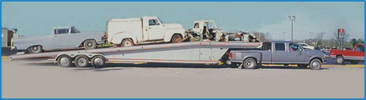 You never know what may be on our trailer on the way home, (left to right) 1958 Ford Rancharo,  a 1952 Chevy Good Humour Ice Cream truck and a 1958 Edsel front clip  Picture  of trailer load of restorable vehicles and parts, 